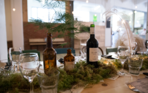 Moss and dried flowers on table as setting